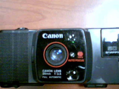 1982 Canon Snappy 50 35mm Film 35mm Lens-Shutter Camera w/CAFS Auto Focus Canon Lens 35mm 1:3.5 Full Automatic Camera (Black Color Version)