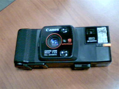 1982 Canon Snappy 50 35mm Film 35mm Lens-Shutter Camera w/CAFS Auto Focus Canon Lens 35mm 1:3.5 Full Automatic Camera (Black Color Version)