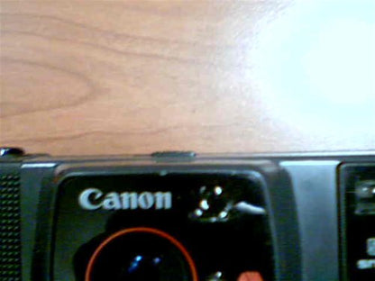 1982 Canon Snappy 50 35mm Film 35mm Lens-Shutter Camera w/CAFS Auto Focus Canon Lens 35mm 1:3.5 Full Automatic Camera (Black Color Version)