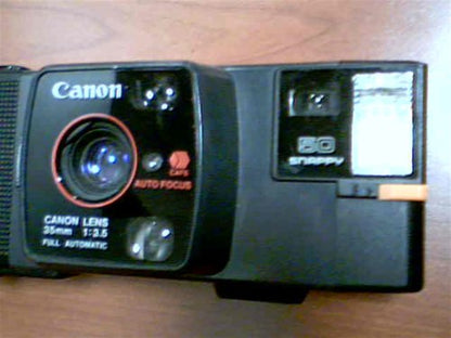 1982 Canon Snappy 50 35mm Film 35mm Lens-Shutter Camera w/CAFS Auto Focus Canon Lens 35mm 1:3.5 Full Automatic Camera (Black Color Version)