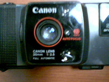 1982 Canon Snappy 50 35mm Film 35mm Lens-Shutter Camera w/CAFS Auto Focus Canon Lens 35mm 1:3.5 Full Automatic Camera (Black Color Version)